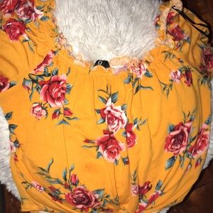 A cute fun summer croc top off the shoulder shirt!